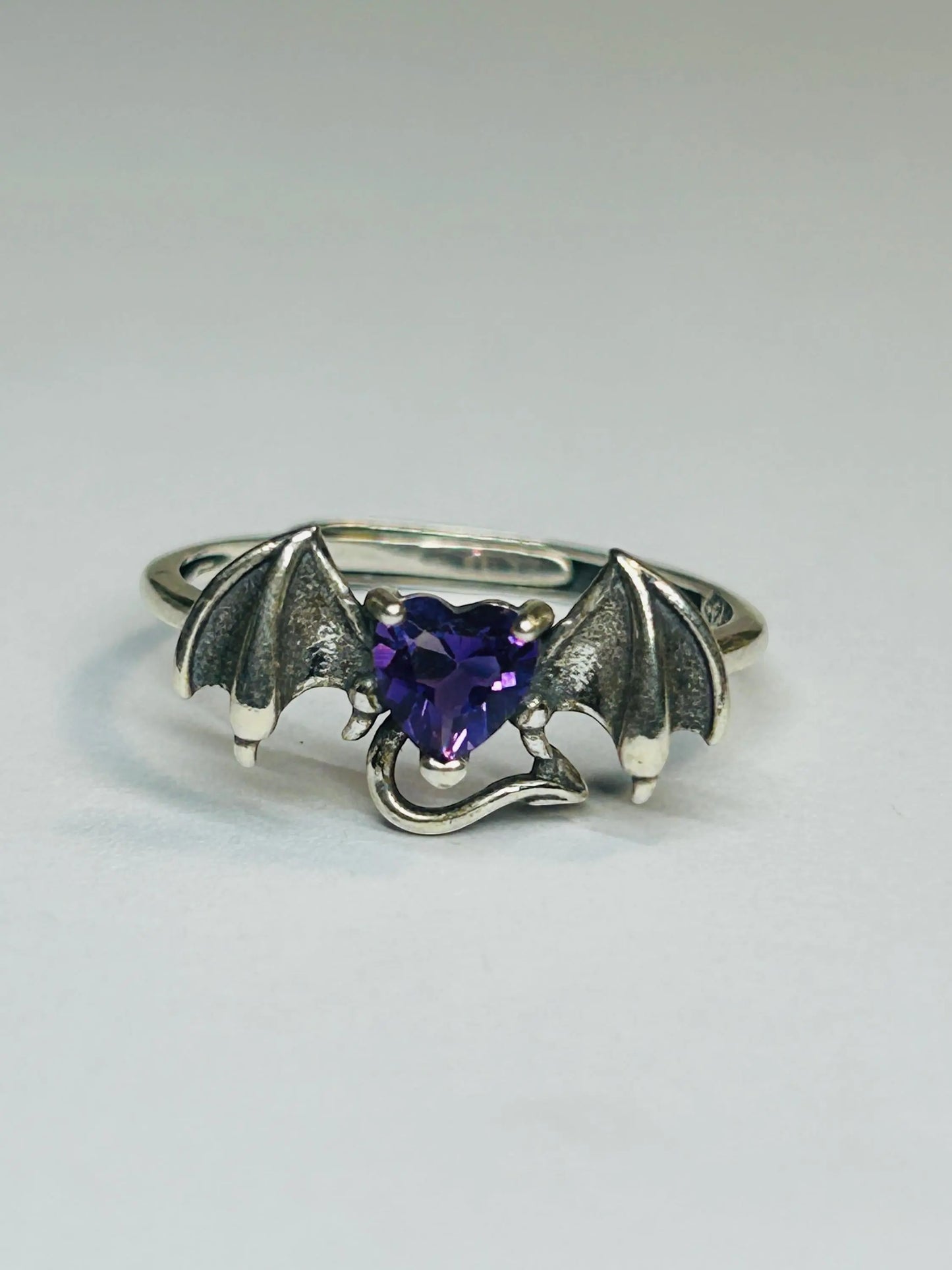 Celtic Dragon Jewellery 925 sterling silver bat ring with heart-shaped amethyst gemstone and oxidised wings.