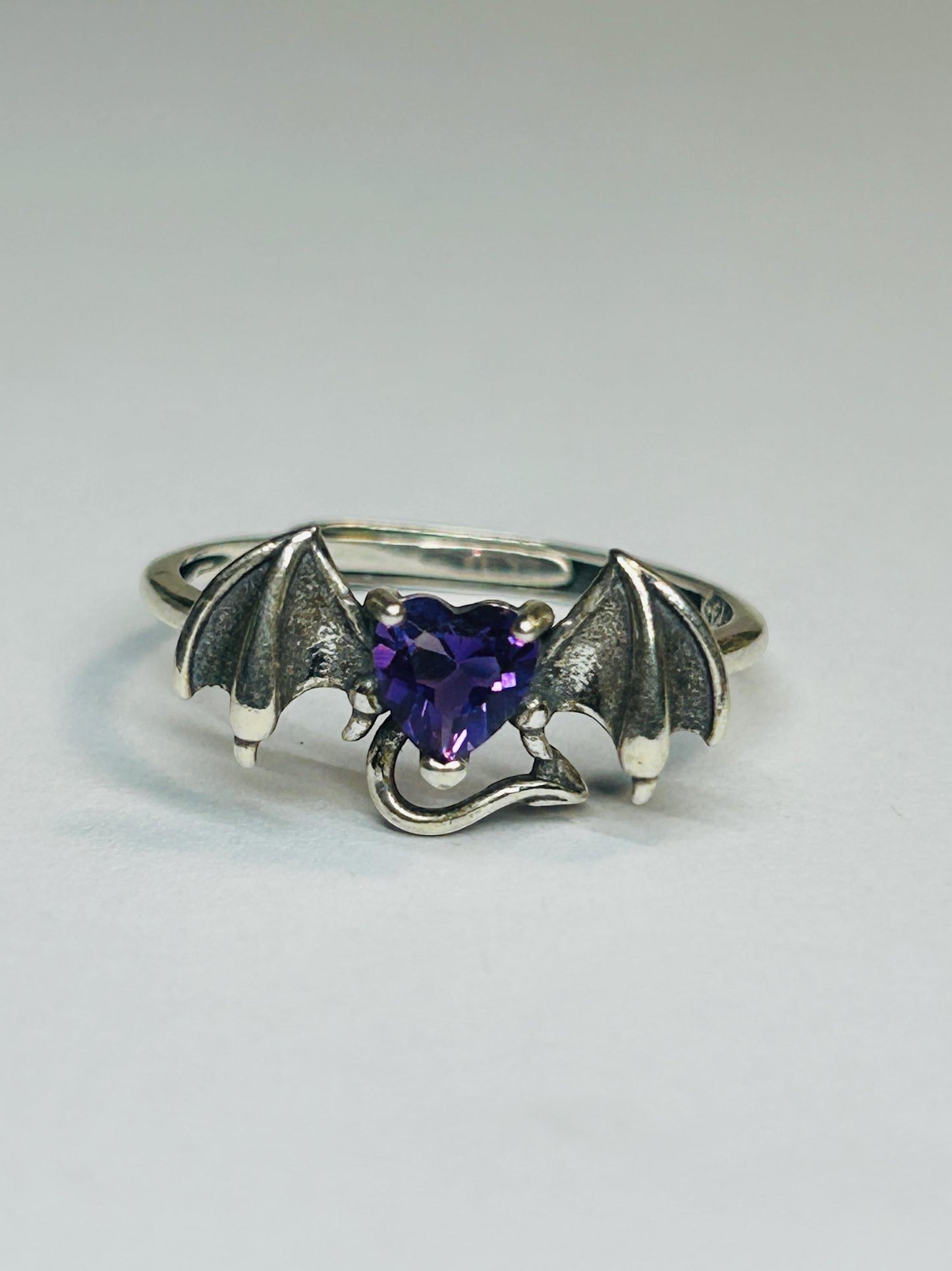 Celtic Dragon Jewellery 925 sterling silver bat ring with heart-shaped amethyst gemstone and oxidised wings.
