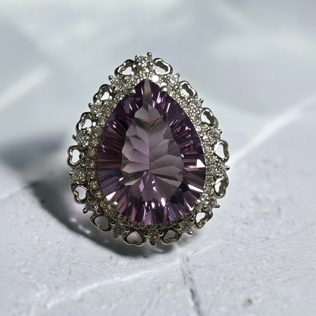 Celtic Dragon Jewellery teardrop amethyst cocktail ring with CZ surround in 925 sterling silver, adjustable statement piece.