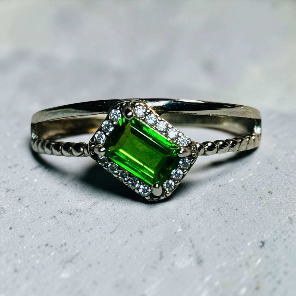 Celtic Dragon Jewellery adjustable 925 silver ring with emerald-cut chrome diopside and clear CZ accents.