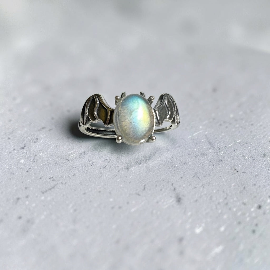 Celtic Dragon Jewellery adjustable sterling silver bat ring with oval labradorite gemstone, Halloween theme.