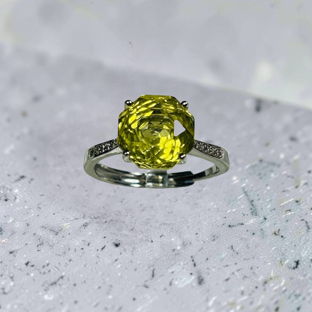 Celtic Dragon Jewellery adjustable sterling silver ring with rose cut lemon citrine and clear CZ accents.