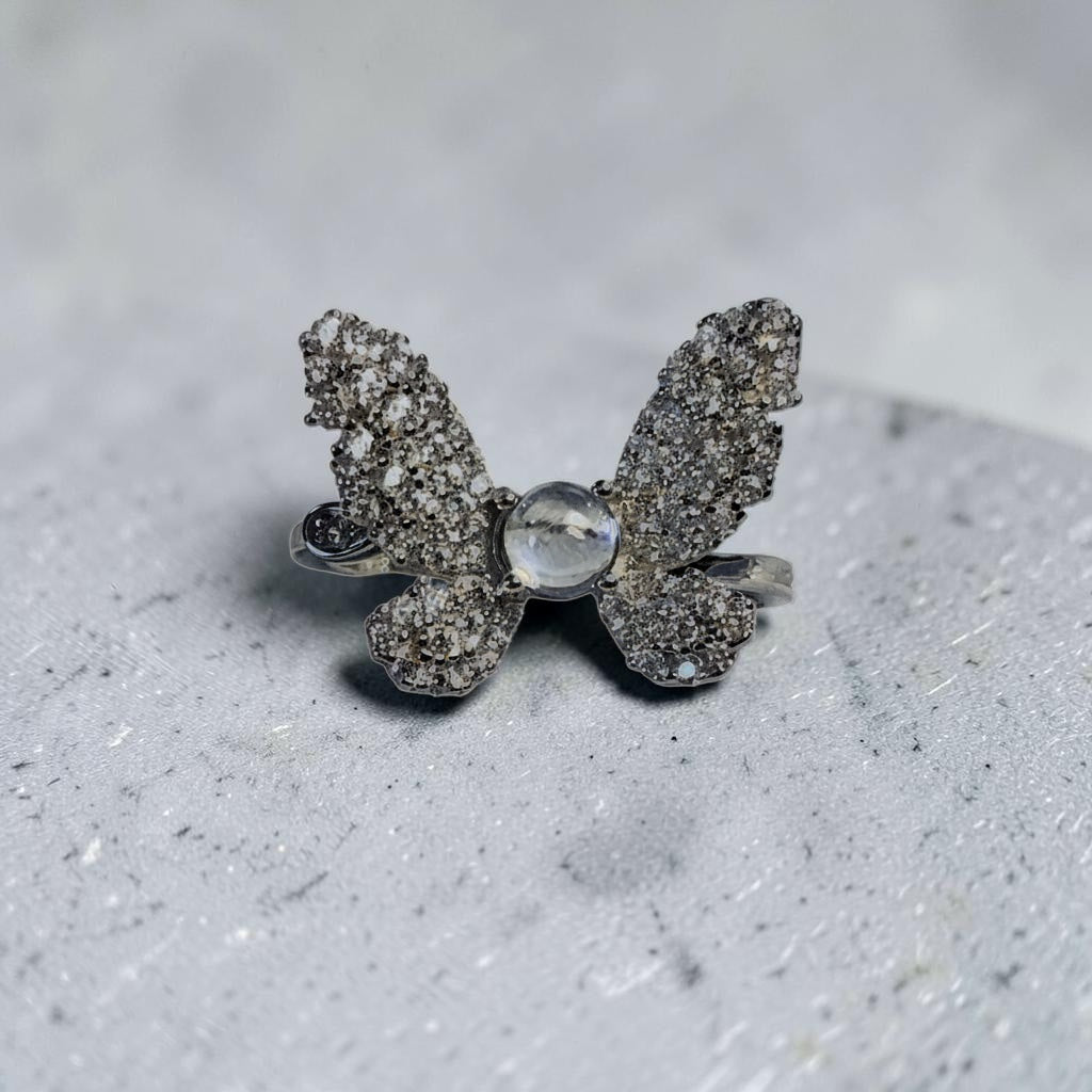 Celtic Dragon Jewellery silver ring with a diamante butterfly and moonstone centre. Size L.