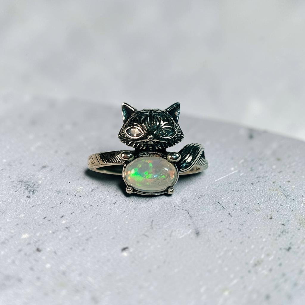 Celtic Dragon Jewellery adjustable 925 sterling silver fox ring with oval rainbow opal and CZ eyes.