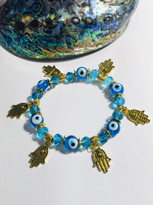 Aqua Blue Evil Eye Bracelet: Gold Hamsa Hand Charm